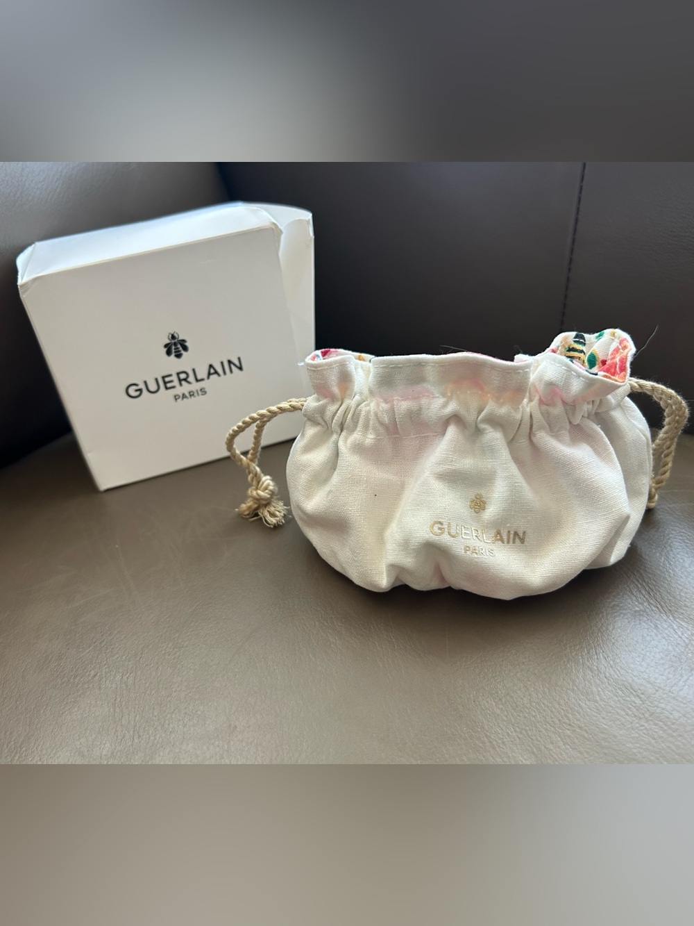 GUERLAIN Cream Drawstring Cosmetic Pouch with Gold Logo